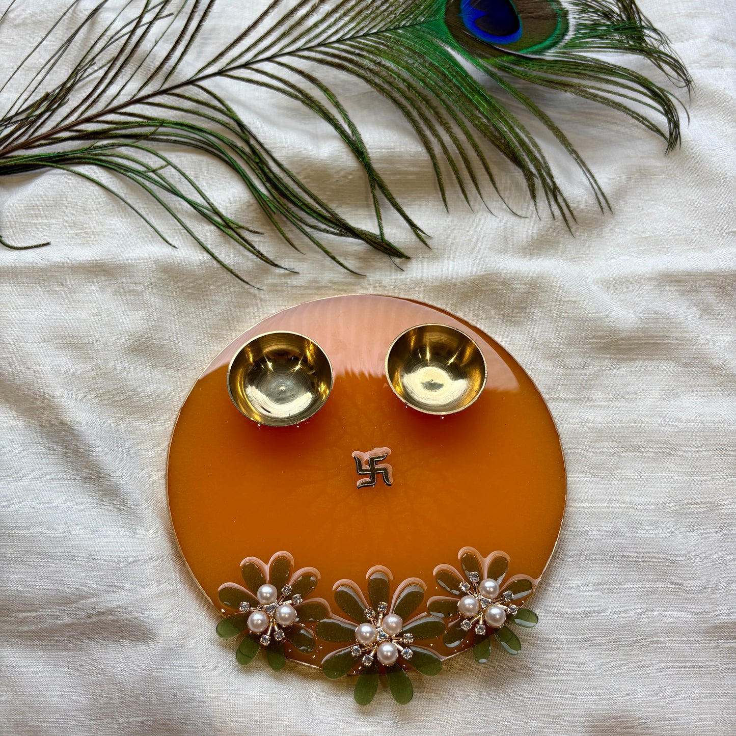 Saffron Blossom Swastik Resin Tilak Plate