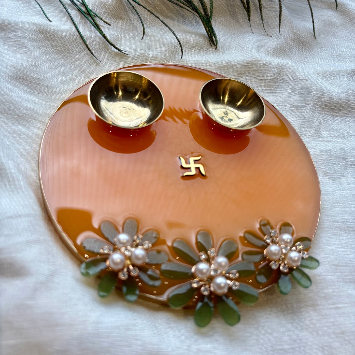 Saffron Blossom Swastik Resin Tilak Plate